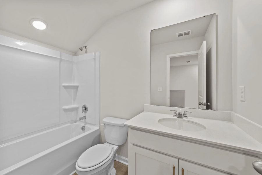 Furnished interior view inside a new home in Blue Heron Retreat, Little River (Image 11).