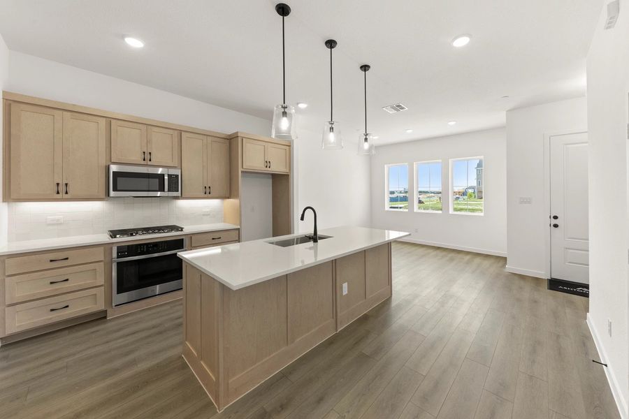 Open Kitchen-Living-Dining Room featuring the Artisan Collection
