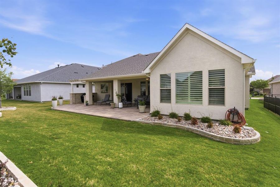 Exterior details and patio area of a home in , Denton (Image 24).
