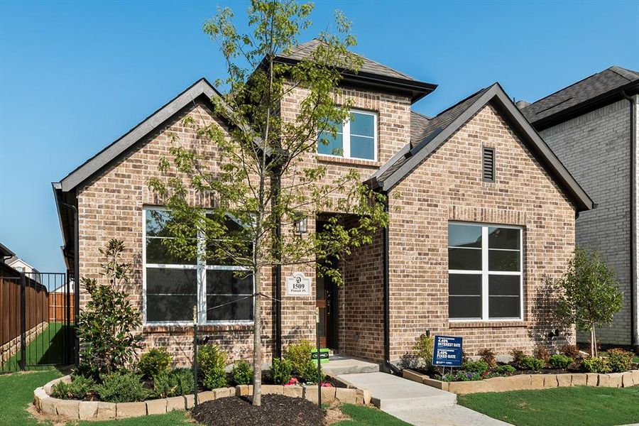 Front exterior of a new home in Cottages of Celina, Celina, TX, highlighting curb appeal (Image 2).