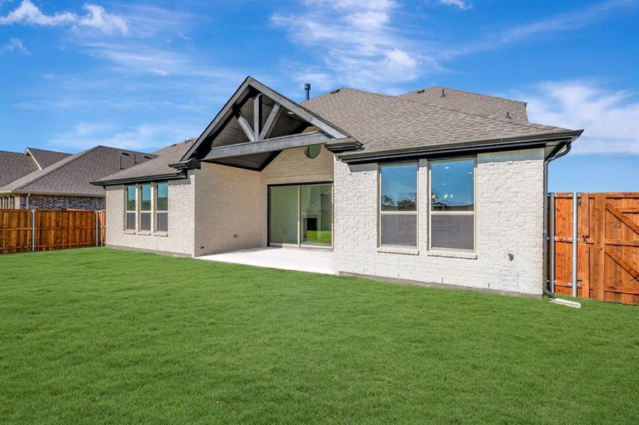 Exterior details and patio area of a home in Kreymer at the Park, Wylie (Image 3).