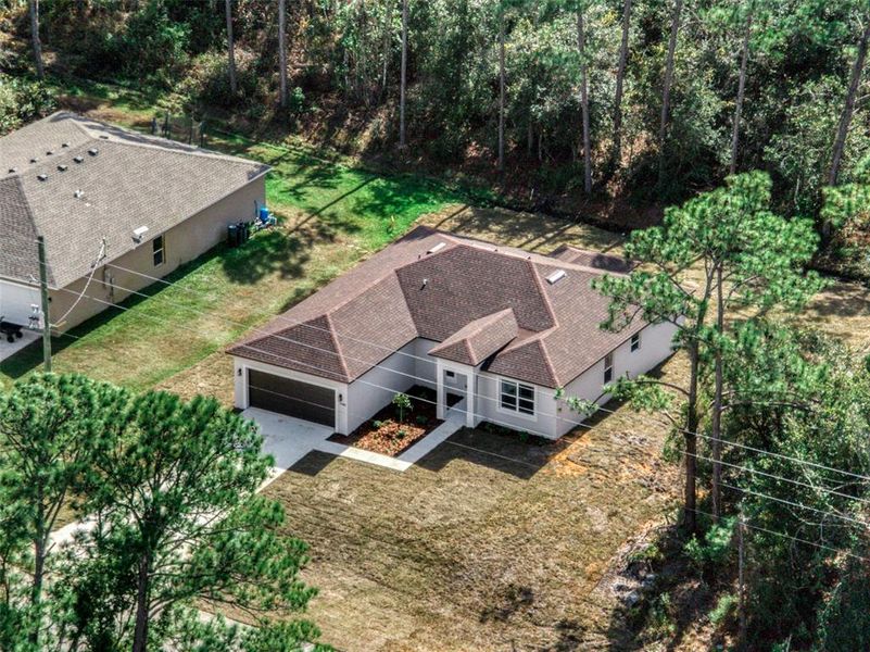 Front exterior of a new home in , Sebring, FL, highlighting curb appeal (Image 2). Front exterior of a new home in , Sebring, FL, highlighting curb appeal (Image 2).