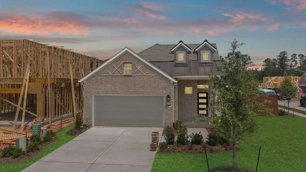 Front exterior of a new home in Evergreen 40s, Conroe, TX, highlighting curb appeal (Image 1). Front exterior of a new home in Evergreen 40s, Conroe, TX, highlighting curb appeal (Image 1).