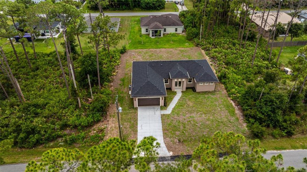 Front exterior of a new home in , North Port, FL, highlighting curb appeal (Image 25). Front exterior of a new home in , North Port, FL, highlighting curb appeal (Image 25).