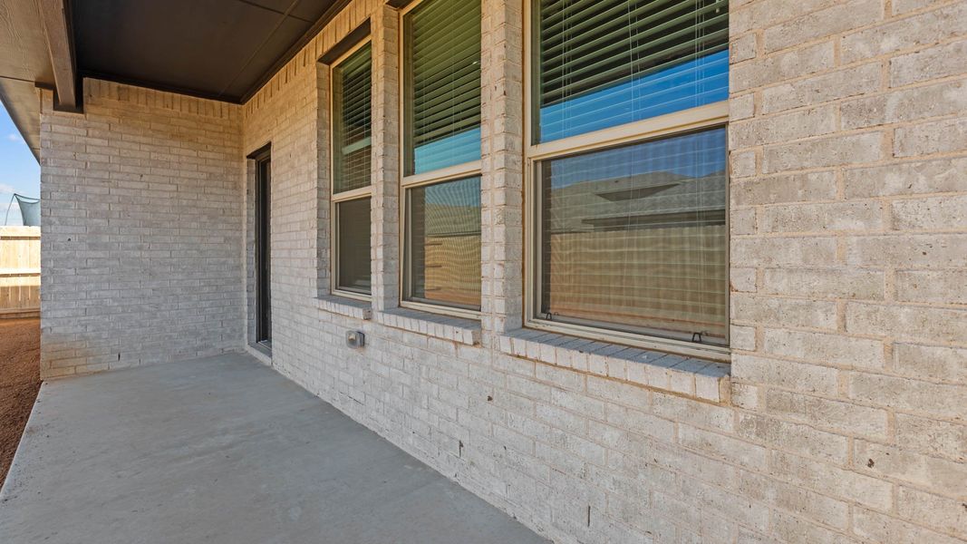 Exterior details and patio area of a home in Northwest Passage, Midland (Image 3).