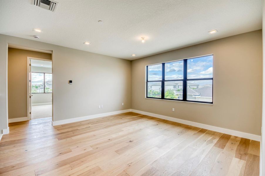 Furnished interior view inside a new home in Apex at Avenir, Palm Beach Gardens (Image 20).