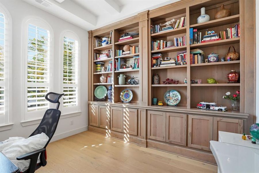 Office area featuring light wood-style floors and baseboards Office area featuring light wood-style floors and baseboards