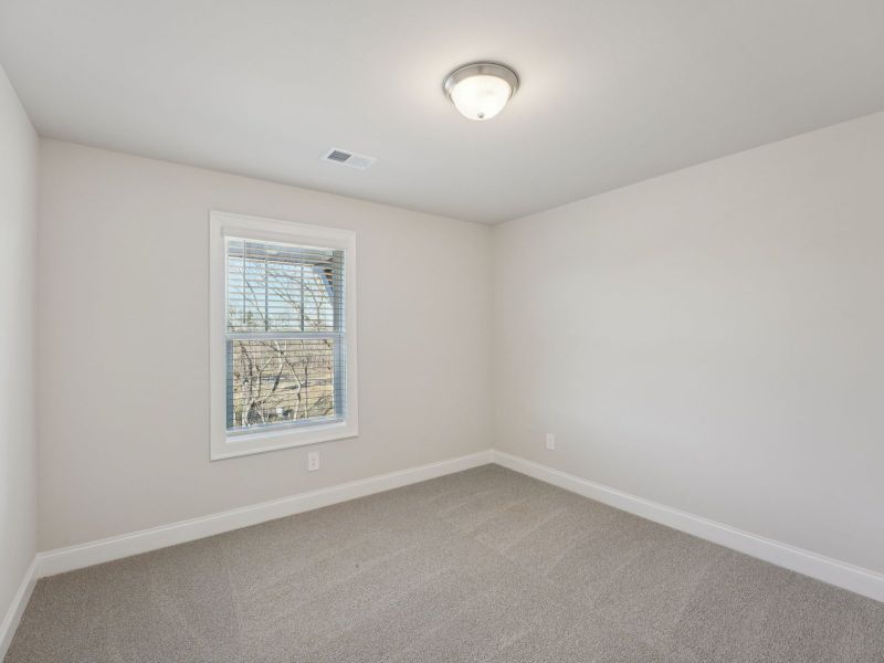 Spacious, unfurnished interior of a new home in Hemingway - Highland Series, Cumming (Image 18).
