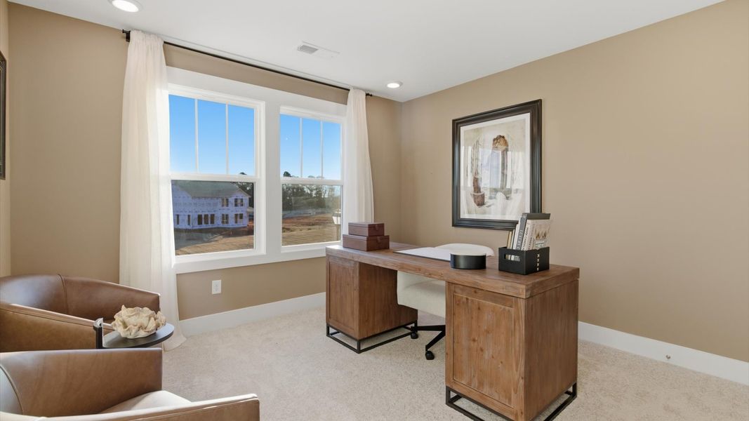 Superior craftsmanship meets practical luxury in this accomplished home office at Pelham Crossing in Greenville, SC