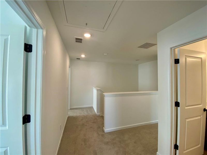 Spacious, unfurnished interior of a new home in Eastlyn Crossing, Flowery Branch (Image 27).
