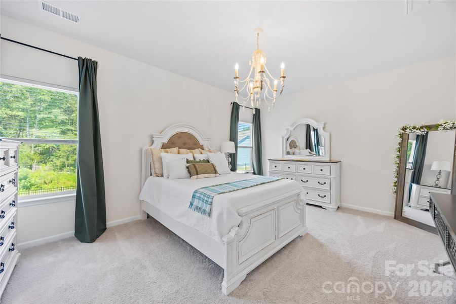 Furnished interior view inside a new home in Orchard Creek, Charlotte (Image 17).