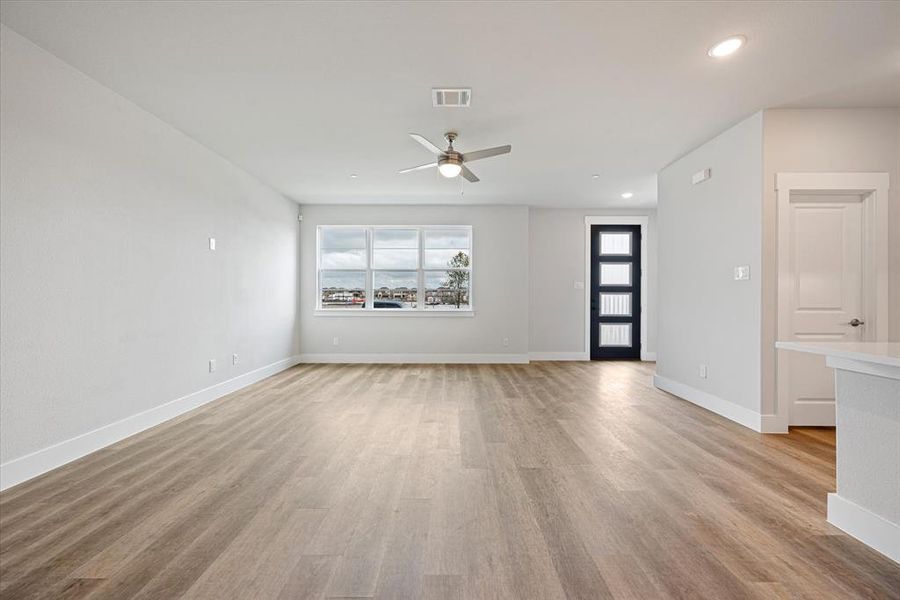 Plenty of memories to be made in this lovely, light filled family room!