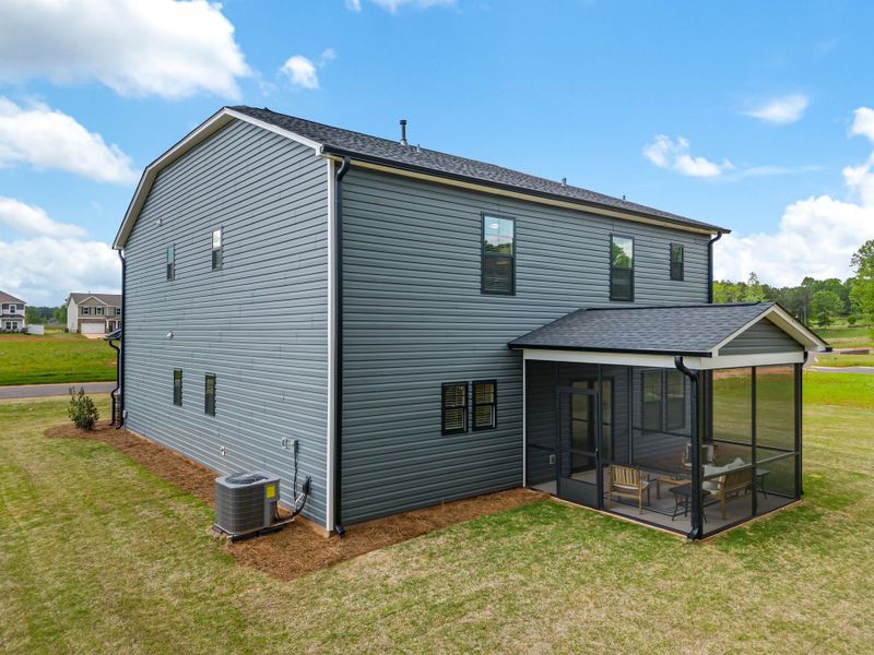 Representative exterior photo of a completed home built from the Brantley II by Great Southern Homes in Collins Cove, Chapin, SC (Image 27).