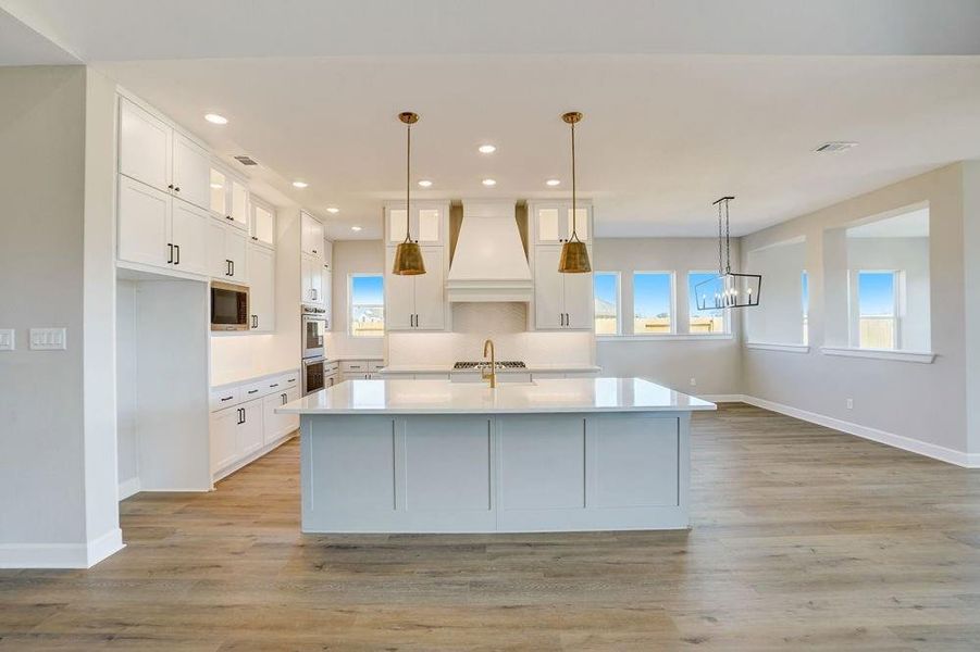 REPRESENTATIVE PHOTO: Another view of Kitchen and Dining areas