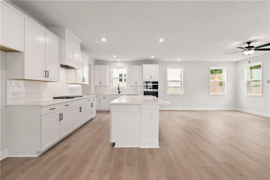 Furnished interior view inside a new home in The Paddocks at Doc Hughes, Buford (Image 6).