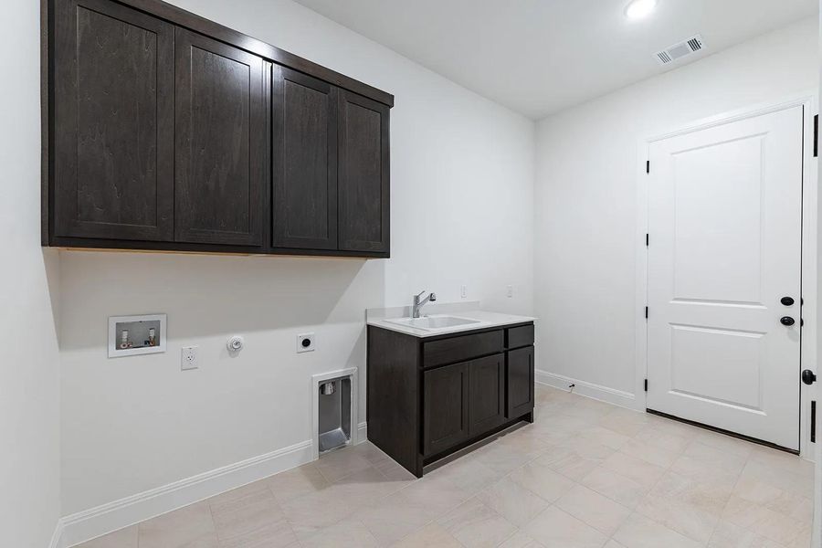 Furnished interior view inside a new home in Parmer Ranch 60, Georgetown (Image 12).