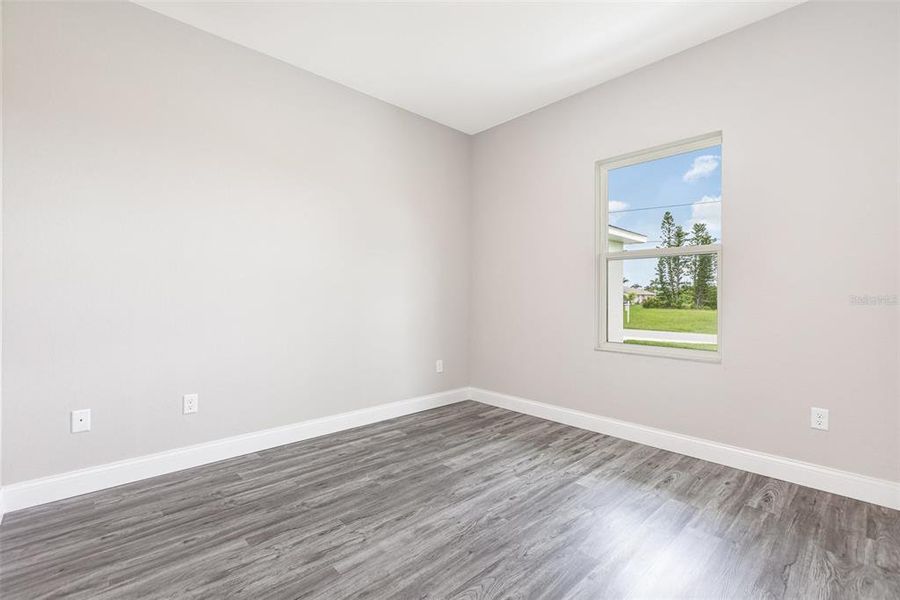 Spacious, unfurnished interior of a new home in , Port Charlotte (Image 19).