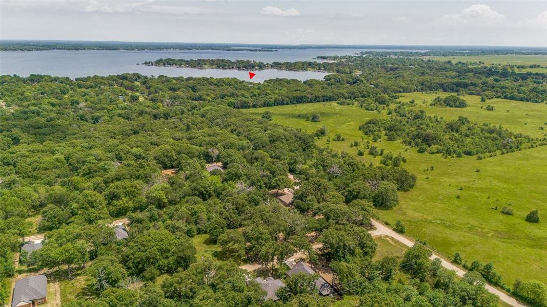 Aerial view with a forest view and a water view. Aerial view with a forest view and a water view.