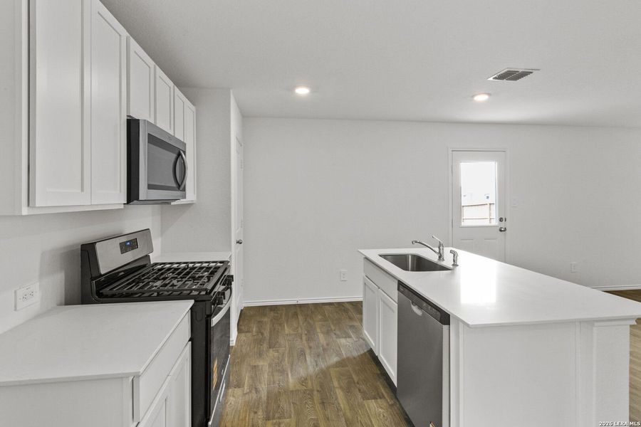 Furnished interior view inside a new home in Avenida, Converse (Image 7).