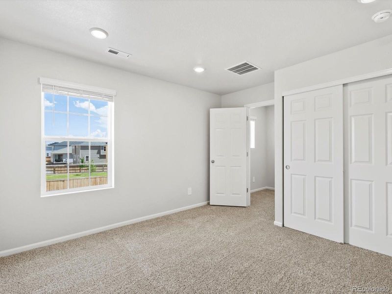Spacious, unfurnished interior of a new home in Ridgeline Vista: The Canyon Collection, Brighton (Image 33).