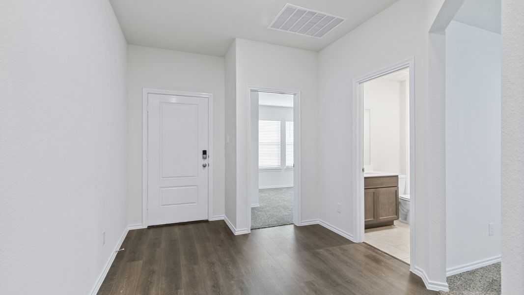 Representative unfurnished interior of a home built from the X40L Lakeway by D.R. Horton in Valor Farms, Royse City (Image 24).