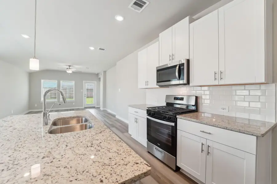 Photo is not of the actual home, but is an inspirational photo of builder’s model home and may depict options, furnishings, and/or decorator features that are not included Photo is not of the actual home, but is an inspirational photo of builder’s model home and may depict options, furnishings, and/or decorator features that are not included