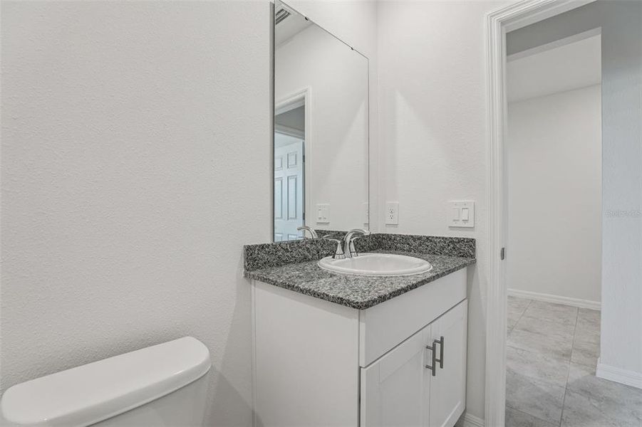 Furnished interior view inside a new home in Bradbury Creek - Signature Series, Haines City (Image 9).