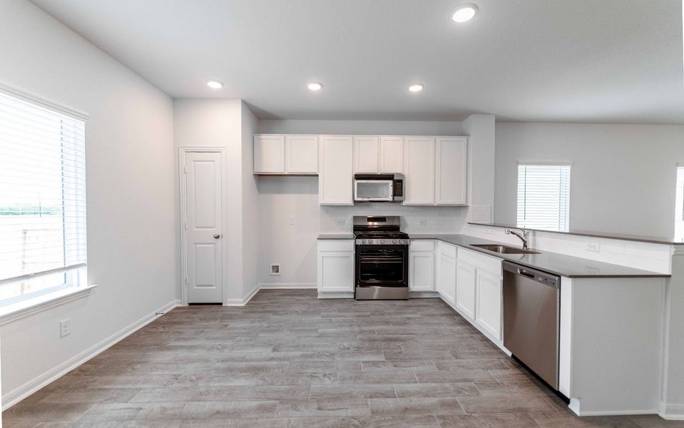 Furnished interior view inside a new home in Hickory Ridge, Elmendorf (Image 4).