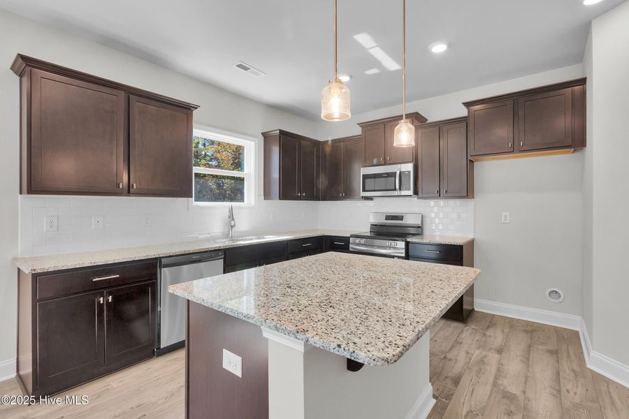 Furnished interior view inside a new home in Fairfield Harbour, New Bern (Image 7).