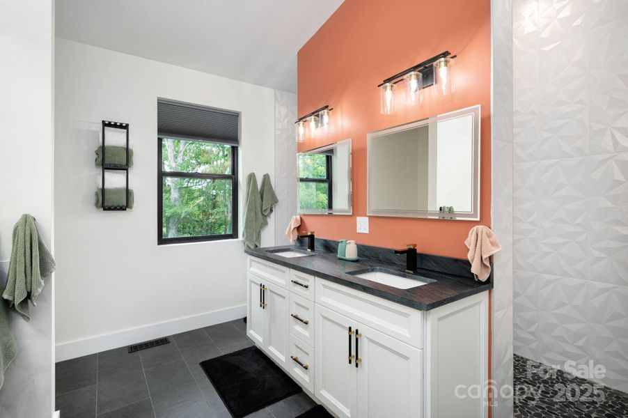 Spa-like Primary Bathroom has Double Sinks...