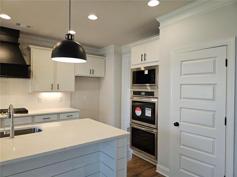 Furnished interior view inside a new home in Calgary Downs, Winder (Image 6).