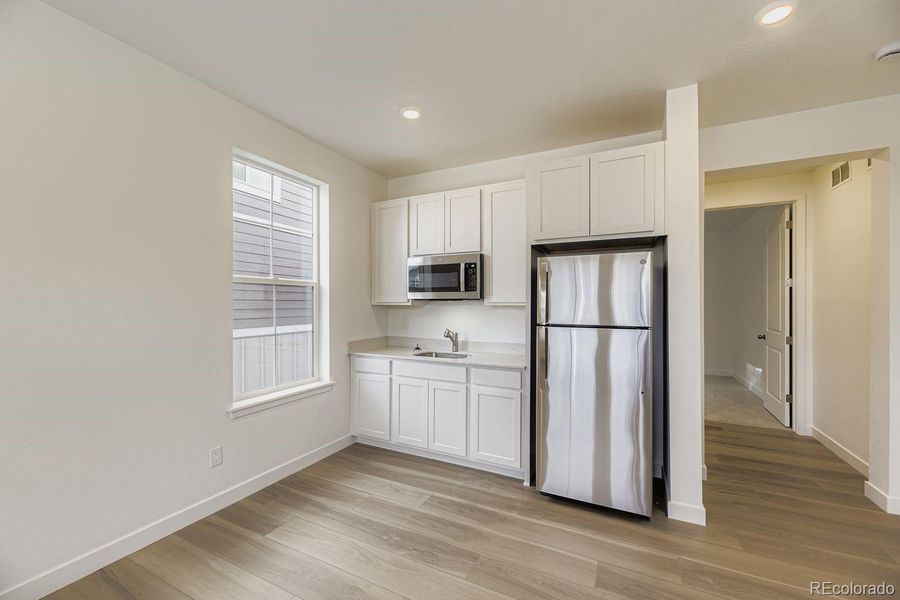 Furnished interior view inside a new home in Newlin Crossing: The Monarch Collection, Parker (Image 7).