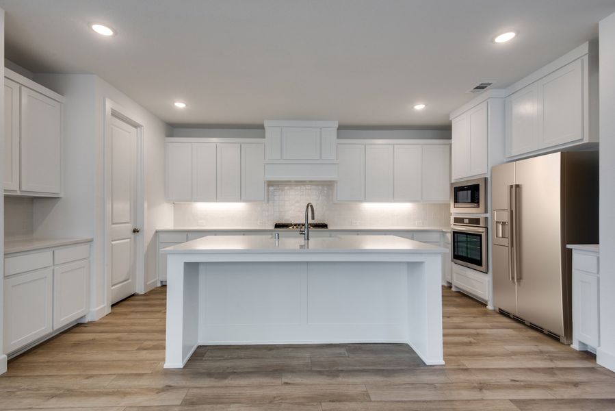 Furnished interior view inside a new home in Painted Tree - South, McKinney (Image 13).