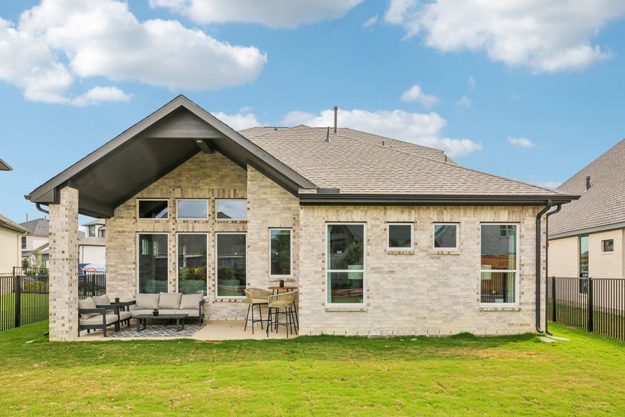 Exterior details and patio area of a home in Bridgeland, Cypress (Image 4).