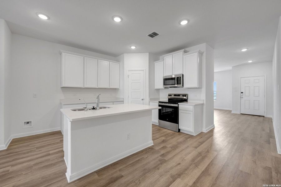 Furnished interior view inside a new home in Greenspoint Heights, Seguin (Image 18).