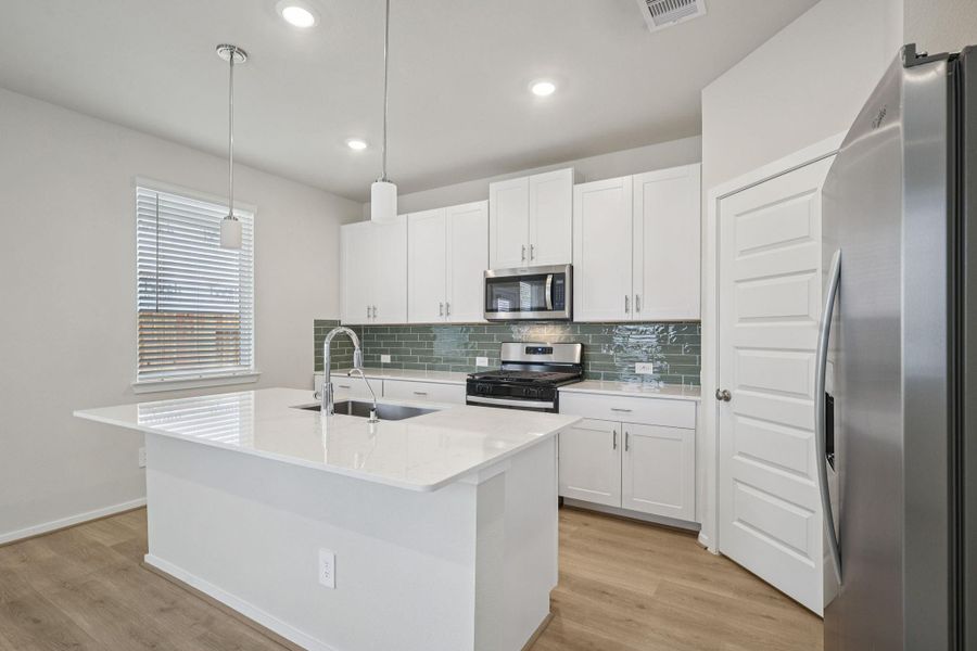 Furnished interior view inside a new home in Pinewood Trails - City Series, Atascocita (Image 9).