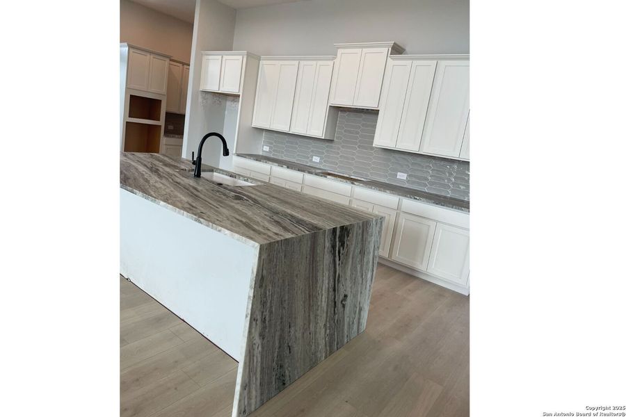 Furnished interior view inside a new home in Potranco Oaks, Castroville (Image 9).