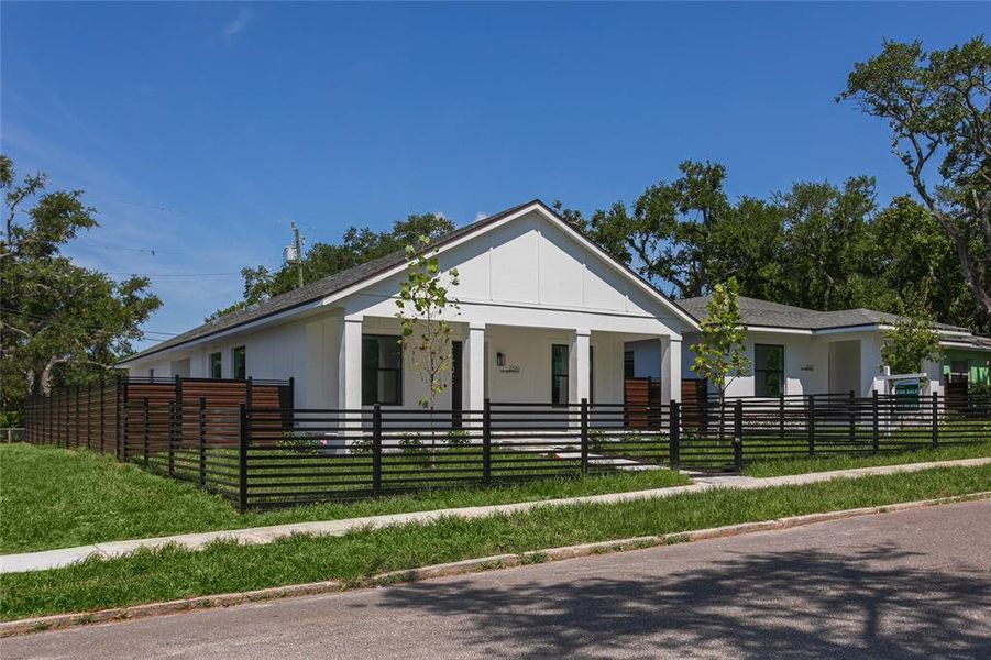 Front exterior of a new home in , St. Petersburg, FL, highlighting curb appeal (Image 25).