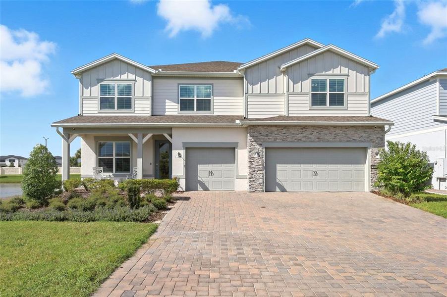 Front exterior of a new home in , Orlando, FL, highlighting curb appeal (Image 20).
