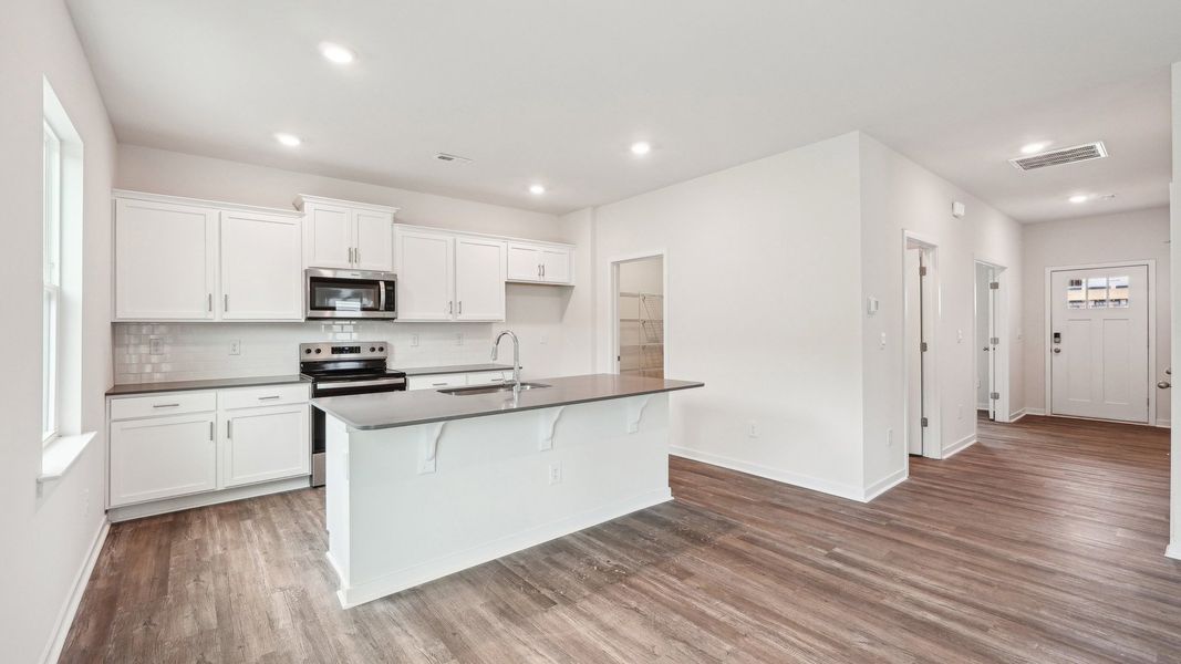 Furnished interior view inside a new home in Reedy Creek Preserve, Charlotte (Image 6).