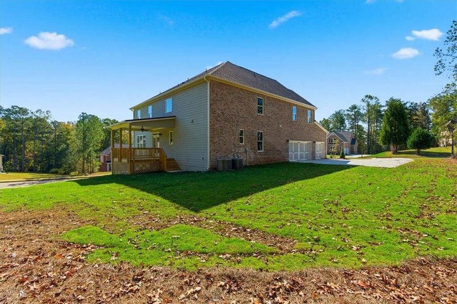 Exterior details and patio area of a home in The Estates at Hurricane Pointe, Douglasville (Image 26).