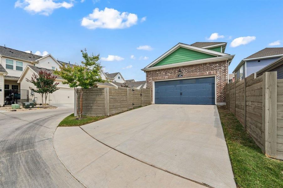 Front exterior of a new home in HomeTown Garden, North Richland Hills, TX, highlighting curb appeal (Image 24). Front exterior of a new home in HomeTown Garden, North Richland Hills, TX, highlighting curb appeal (Image 24).