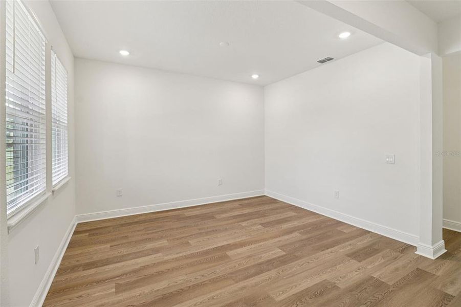 Spacious, unfurnished interior of a new home in Legends Preserve - Signature Series, Daytona Beach (Image 20).