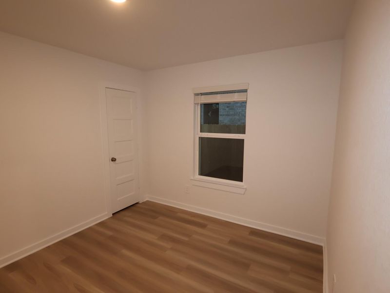 Spacious, unfurnished interior of a new home in Wildrye, Waller (Image 28).