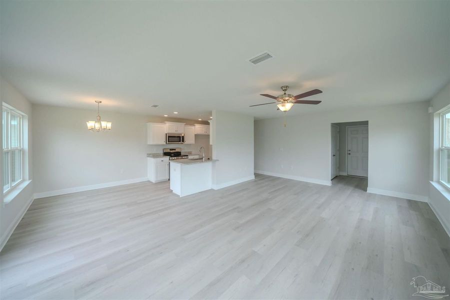 Representative unfurnished interior of a home built from the 1648 by Adams Homes in Parkland Place, Pace (Image 11).