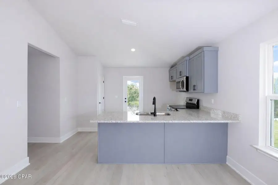 Furnished interior view inside a new home in Fox Glenn, Panama City (Image 4).