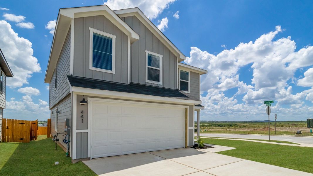 Representative exterior photo of a completed home built from the The Franklin by D.R. Horton in Prairie Lakes, Buda, TX (Image 12). Representative exterior photo of a completed home built from the The Franklin by D.R. Horton in Prairie Lakes, Buda, TX (Image 12).