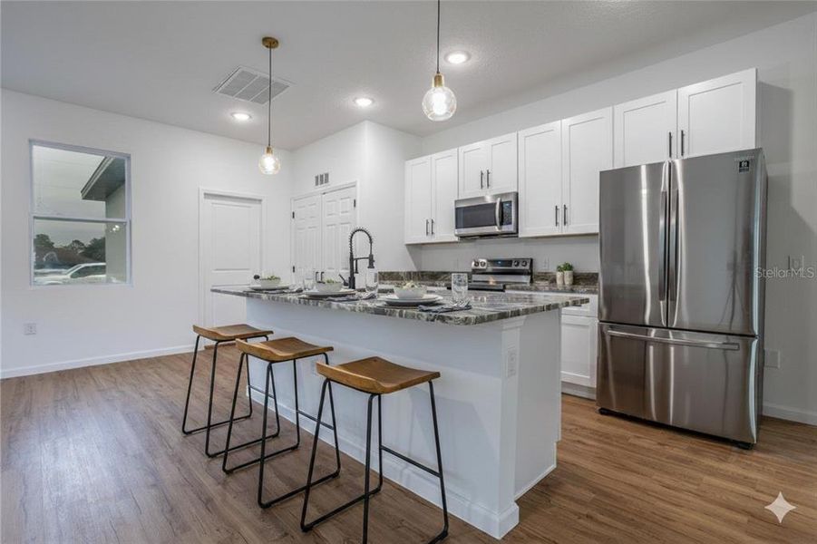 Furnished interior view inside a new home in , Poinciana (Image 9).