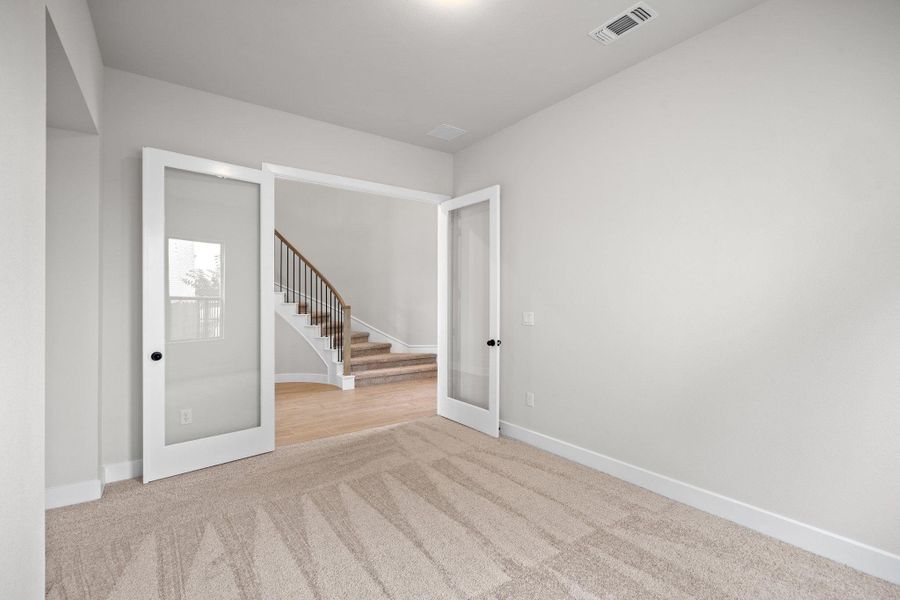Spacious, unfurnished interior of a new home in Santa Rita Ranch - 60', Liberty Hill (Image 15). Spacious, unfurnished interior of a new home in Santa Rita Ranch - 60', Liberty Hill (Image 15).