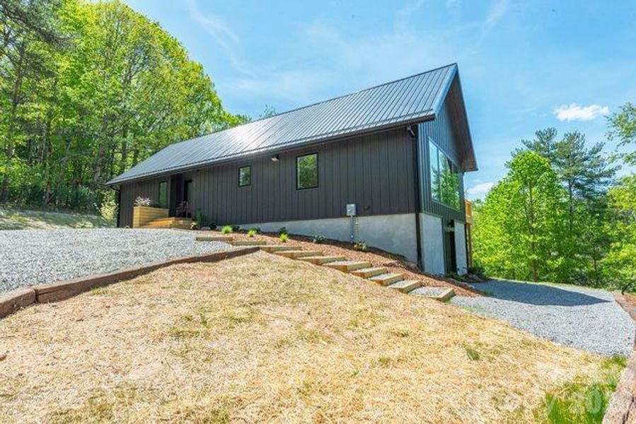 Exterior details and patio area of a home in , Asheville (Image 18).